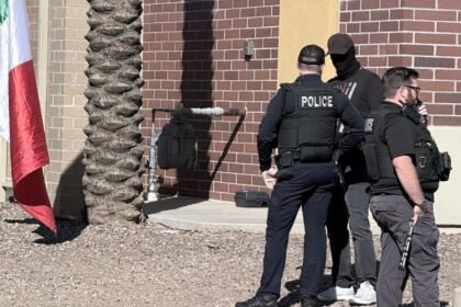 Armed Off-Duty Cop Tried to Incite Violence at High School ICE Protest